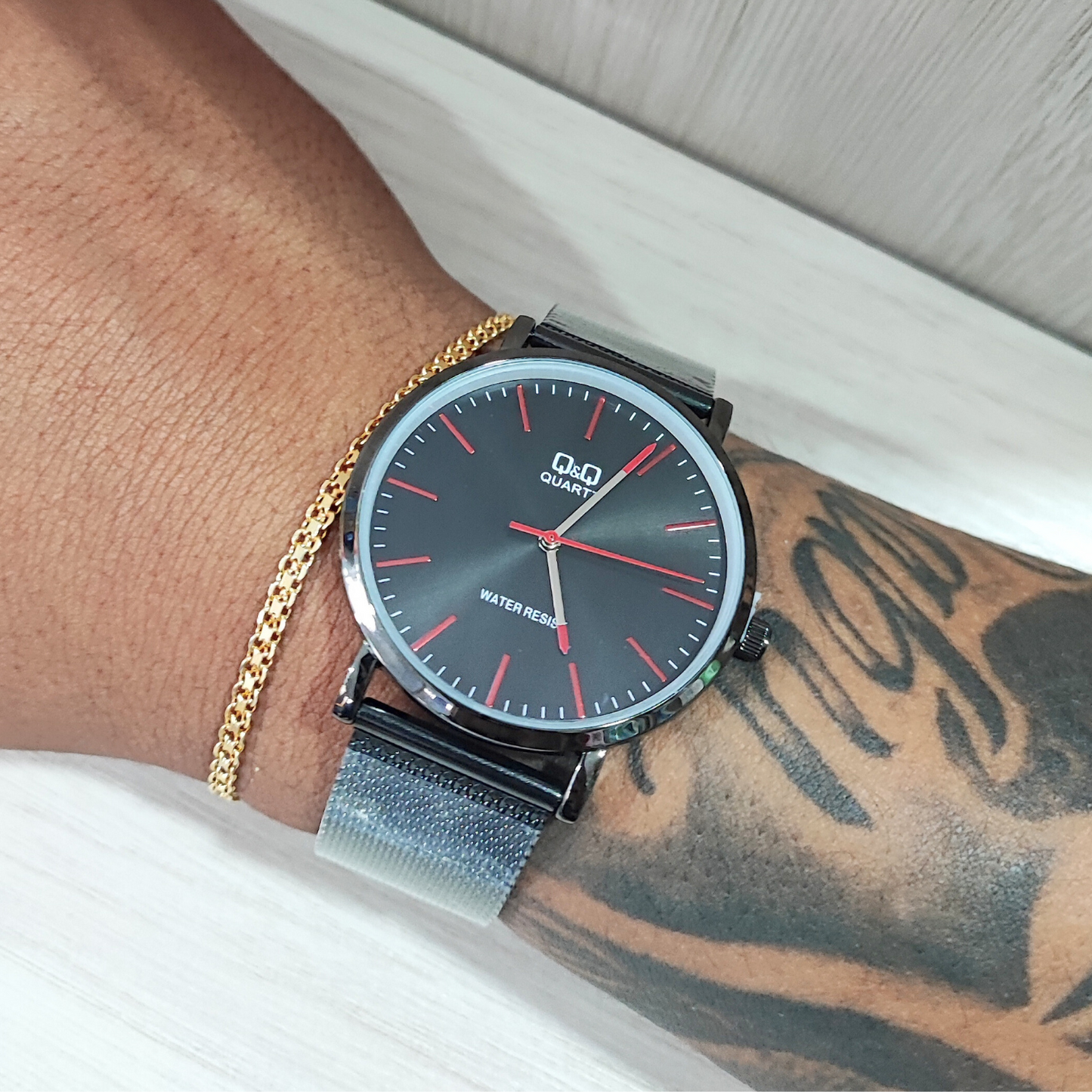 RELOJ QYQ PLANO PULSO ACERO MALLA GRADUABLE