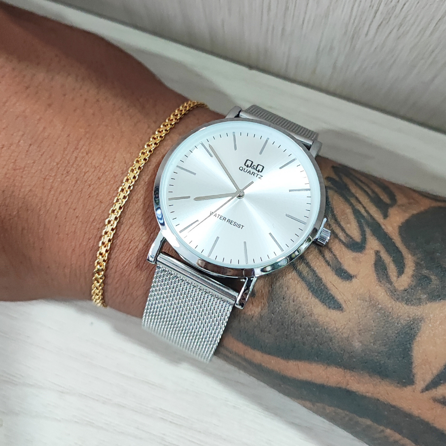 RELOJ QYQ PLANO PULSO ACERO MALLA GRADUABLE
