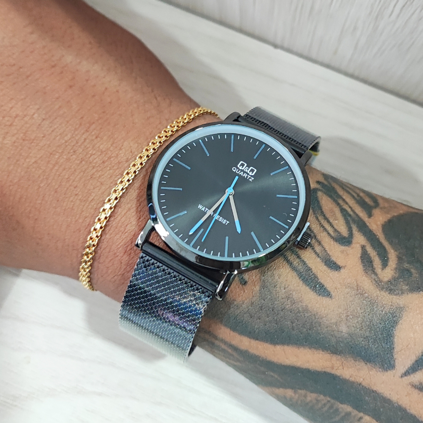 RELOJ QYQ PLANO PULSO ACERO MALLA GRADUABLE